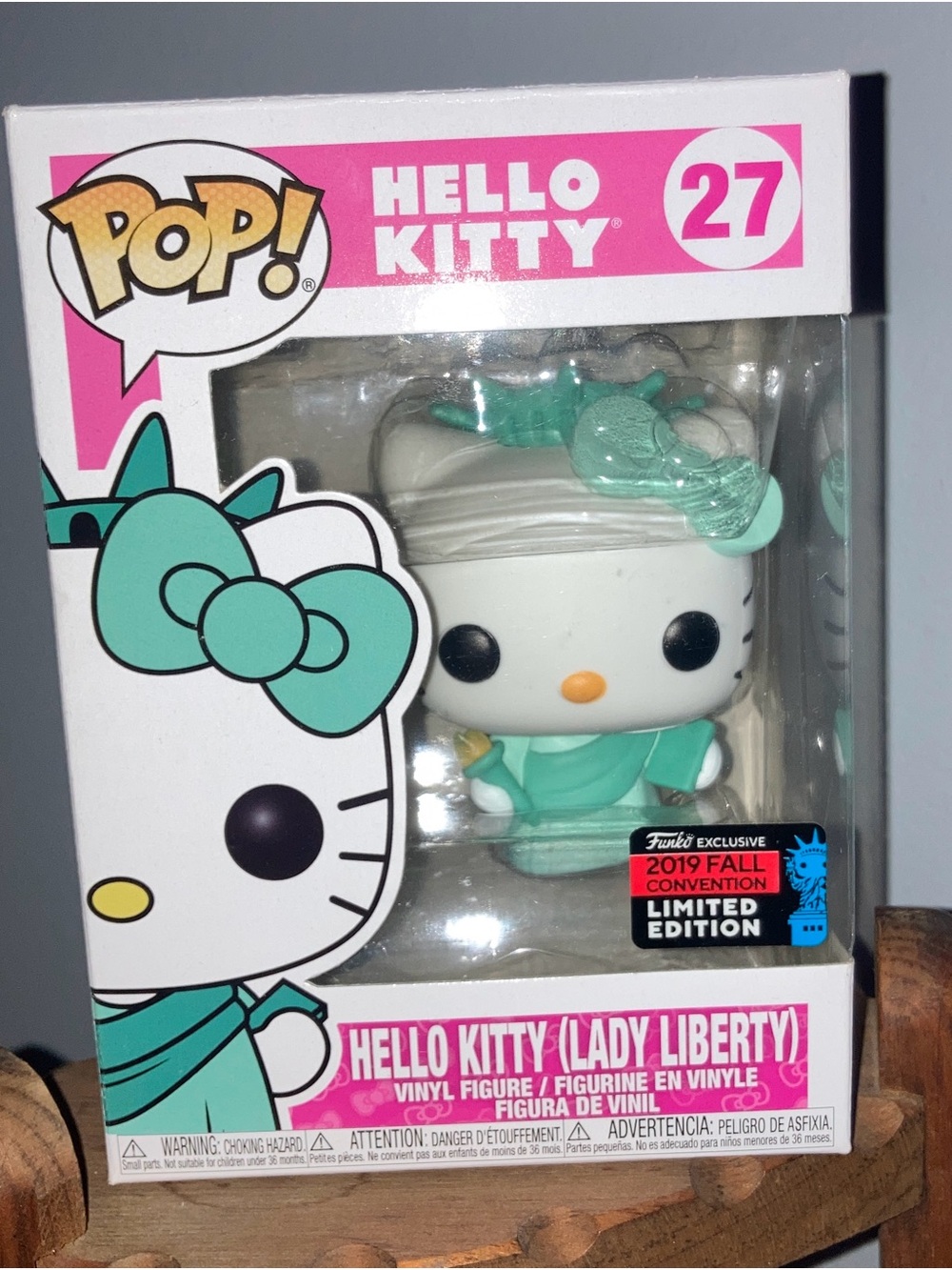 Funko Hello Kitty Statue with Teal Bow and Pink Backing